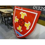A modern perspex Shield shaped crest, decorated cross and rose