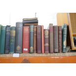 A selection of books, including Lewis Carroll, Birds of the British Isles, etc