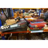 A vintage Scalextric set and a selection of boxed cars, etc and some vintage board games