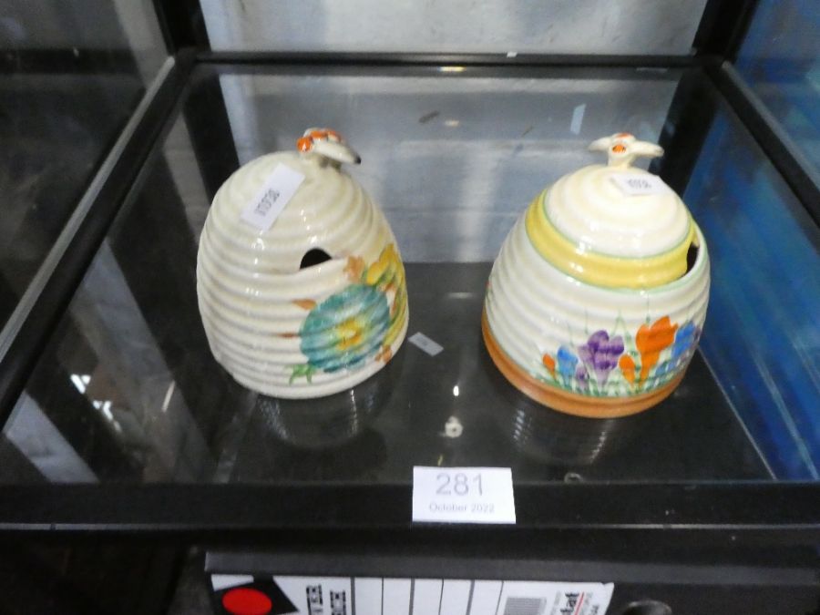 A Clarice Cliff Crocus design Honey Pot, (chip underneath), and one other having Honey Dew pattern