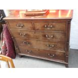 An antique mahogany chest having two short and three long drawers, with cluster column corners, 118