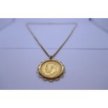 9ct yellow gold curblink neck chain hung with 1927 Full Sovereign George V, George and the Dragon, S