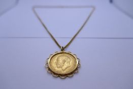 9ct yellow gold curblink neck chain hung with 1927 Full Sovereign George V, George and the Dragon, S