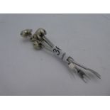 A quantity of four white metal olive forks terminating in Elephant finials. Very sweet set
