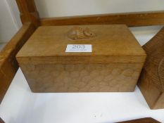 Mouseman Thompson, an oblong lidded box, the lid decorated carved mouse, 18.5cm