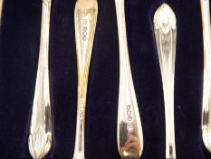 A set of twelve cased silver Thomas Bradbury and Sons Ltd teaspoons having Tulip handle tips, Sheffi