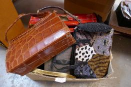 A selection of handbags, including beaded, vintage, leather, etc