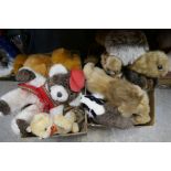 Four boxes of vintage soft toys