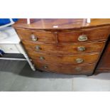 An antique mahogany bow fronted chest having 2 short and 3 long drawers