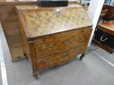 An antique North Italian bureau having 2 serpentine drawers with all over chequered decoration, 96cm