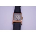 Vintage 9ct gold cased gents watch on black leather strap, cased marked London DBS, with original gu