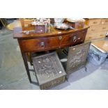 An antique mahogany bow fronted side table, having one long drawer on square legs