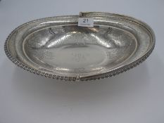 A large Victorian silver fruit bowl with very pretty engraved decoration, of butterflies, flowers an