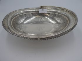 A large Victorian silver fruit bowl with very pretty engraved decoration, of butterflies, flowers an