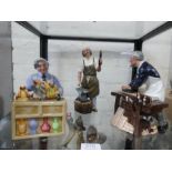 Three Royal Doulton figures of 'The Carpenter', 'The Blacksmith' and 'The China Repairer'