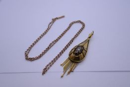 9ct yellow gold chain, marked 9ct, hung with a higher (possibly 18ct) antique pear shaped pendant wi