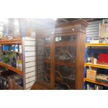 A secretaire bookcase with glazed doors