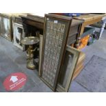 A framed display of cigarette cards, a cherub table and a mirror