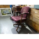 An old oak revolving desk chair