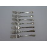 A set of seven smaller silver forks by Walker and Hall, Sheffield 1934 engraved handle ends, 11.67oz