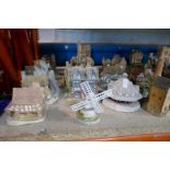 A large selection of Lilliput Lane and David Winter figures