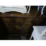 A Victorian mahogany dressing chest having two short and two long drawers