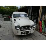 A 1957 Reliant Regal motor car, unused for over 40 years, but garaged, registration OTP 641, with ad