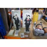 A selection of Laurel and Hardy collectables, including figures, etc