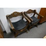 A pair of stained beech Spanish style throne chairs having black leather seats, with carved decorati
