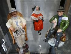 Three Royal Doulton figures of 'The Judge', 'A Good Catch' and 'Taking Things Easy'