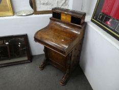 A Victorian burr Walnut Davenport having rising back with 4 drawers