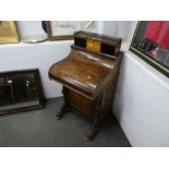 A Victorian burr Walnut Davenport having rising back with 4 drawers