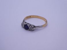 18ct and Platinum Sapphire and diamonds with central square cut sapphire flanked two small illusion