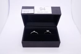 Pretty Platinum and diamond wedding set comprising a Platinum band with a trilliant cut diamond and