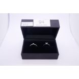 Pretty Platinum and diamond wedding set comprising a Platinum band with a trilliant cut diamond and