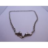 Continental silver belcher chain with the clasp being in the form of two Dolphins