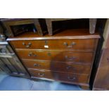 An antique mahogany chest having four long drawers on bracket feet