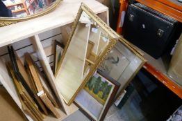 A selection of pictures, prints and bevelled mirrors