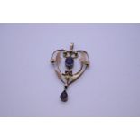 Antique 9ct yellow gold Art Nouveau design heart shaped pendant, with central oval faceted Amethyst,