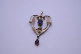 Antique 9ct yellow gold Art Nouveau design heart shaped pendant, with central oval faceted Amethyst,