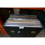 A box of various vinyl LPs, including Jimmy Hendrix