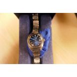 Longines; boxed ladies Longines wristwatch with baton markers and whiteface, in box with booklet and