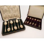 A cased set of decorative silver small teaspoons having various ornate bowls, Wrythen handles and fi