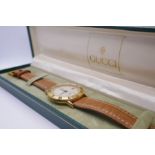 Gucci' a Gent's Gucci wristwatch model 3800 on tan leather strap in original box