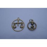 Two 9ct yellow gold charms, one with seated Pixie, the other depicting scales, both marked, weight a