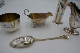 A very pretty sugar sifter having cylindrical body and ornate, pierced top by Cooper Brothers and So