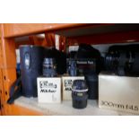 A large selection of vintage cameras and lenses including Olympus and Nikon, lenses mostly in origin