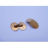 Pair of 9ct yellow gold oval cufflinks, marked 375, plain surface, approx 7.5g