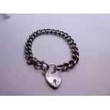 Silver curblink bracelet with heart shaped clasp and safety chain, each link marked 42.6g approx