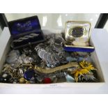 A tray of antique and later costume jewellery including silver charm bracelet, cameo brooches, brace